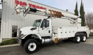 White Digger Derrick Truck